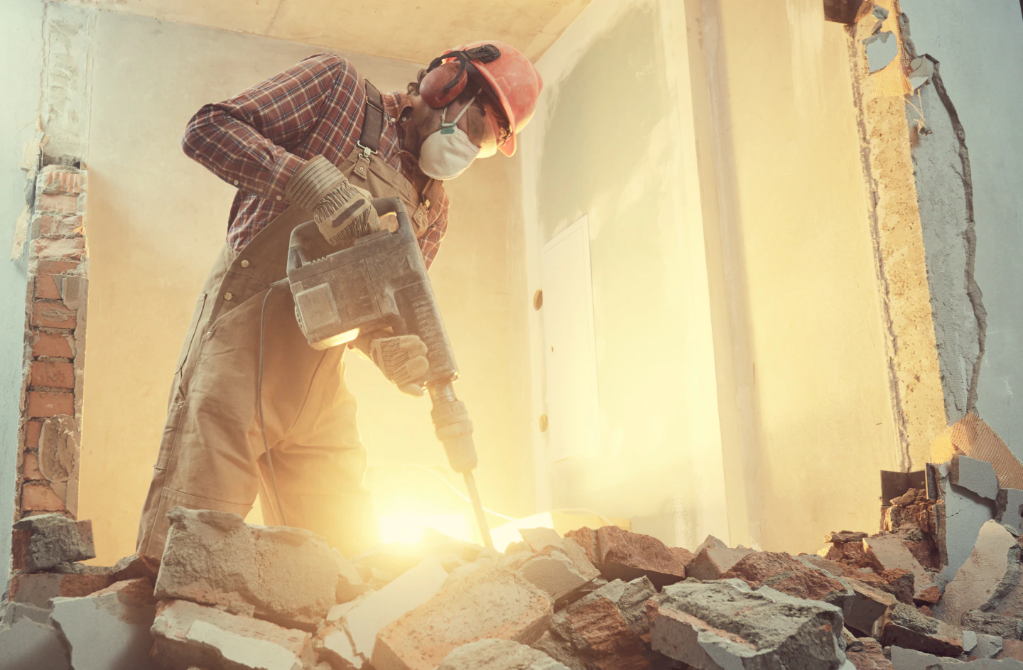 house wall demolition man using jackhammer bangor pa